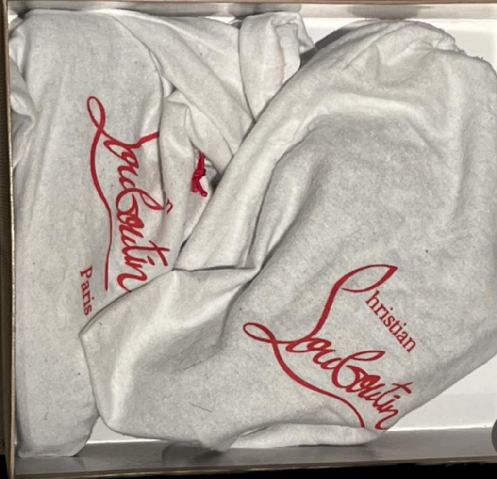 Christian Louboutin Sneakers - Dust Jackets