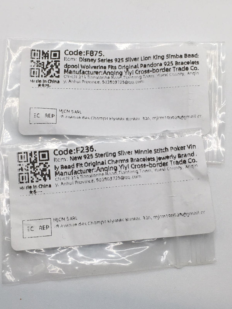 Two packages with labels on a white background