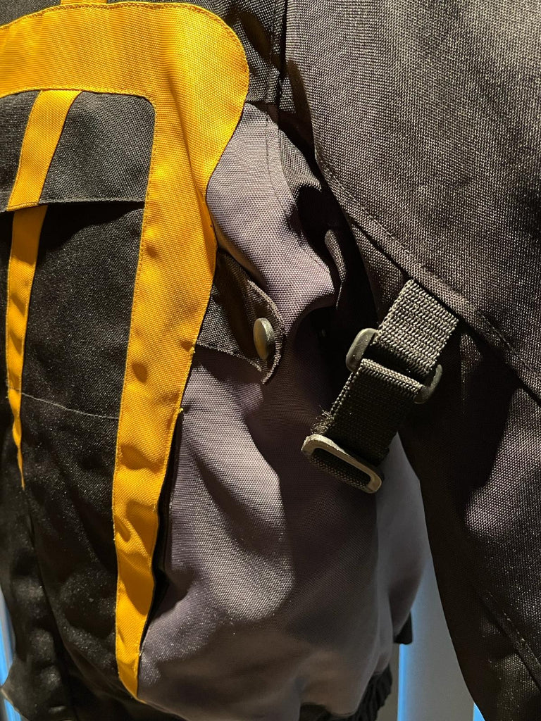 Unbranded black and yellow motorbike coat fixings