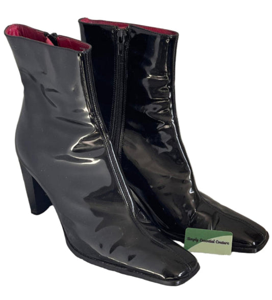 Black iBLUES patent leather boots with a visible brand tag on a white background