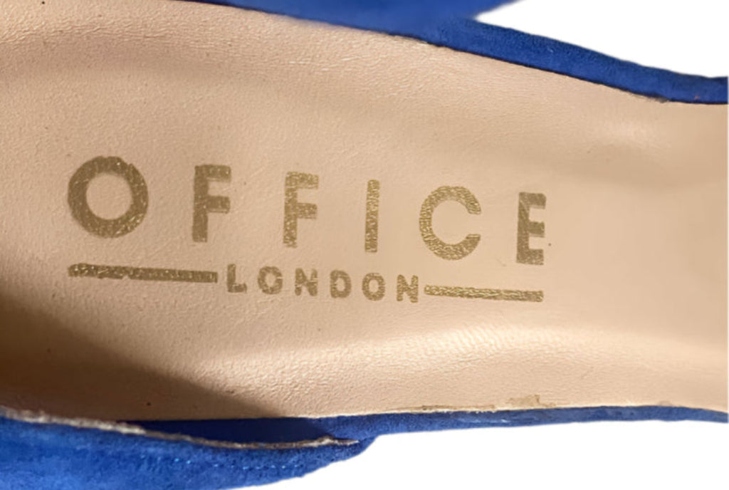 Close-up of 'Office London' branding on a blue shoe sole.