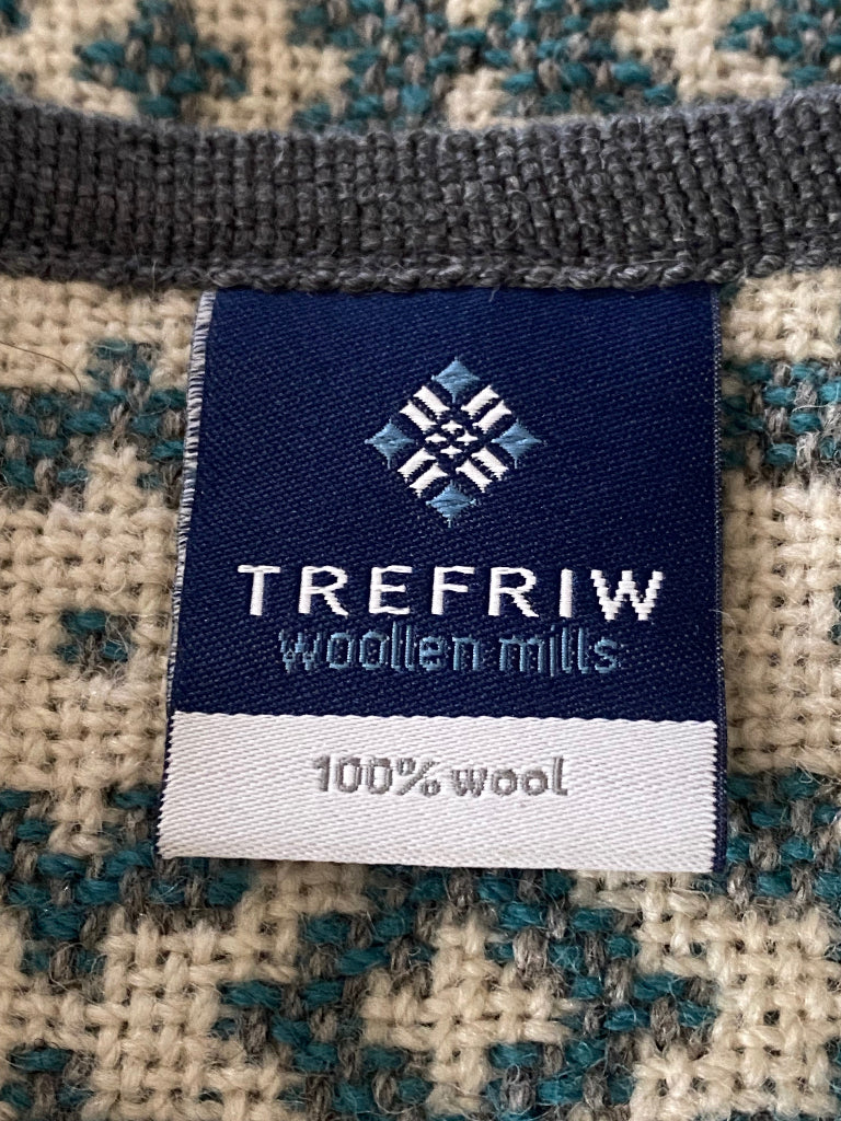 Trefriw Woollen Mills label on a textured fabric background
