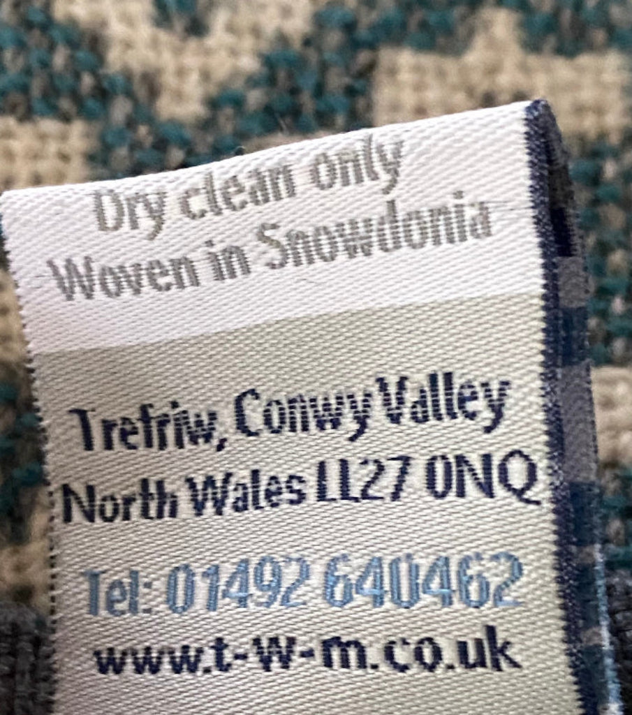 TREFRIW Fabric label with text on a textured surface