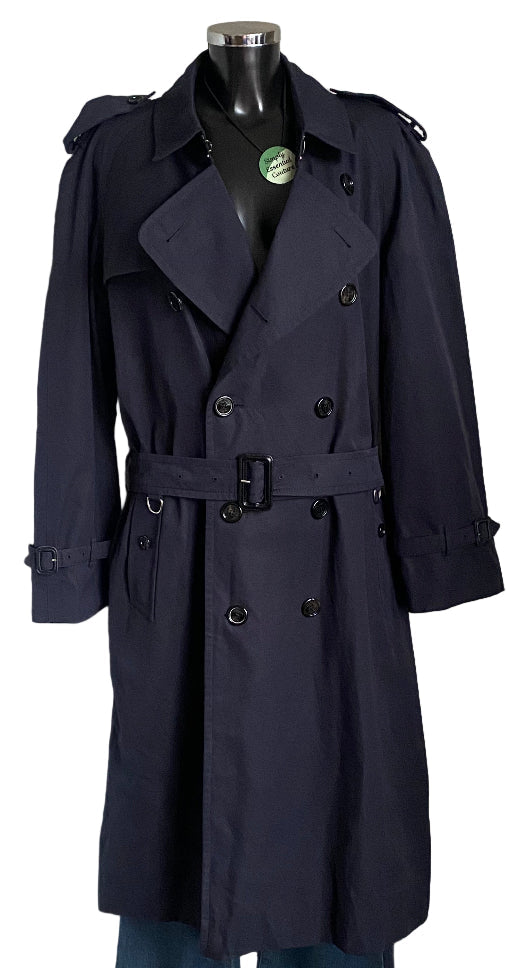 Navy blue trench coat on a mannequin against a white background
