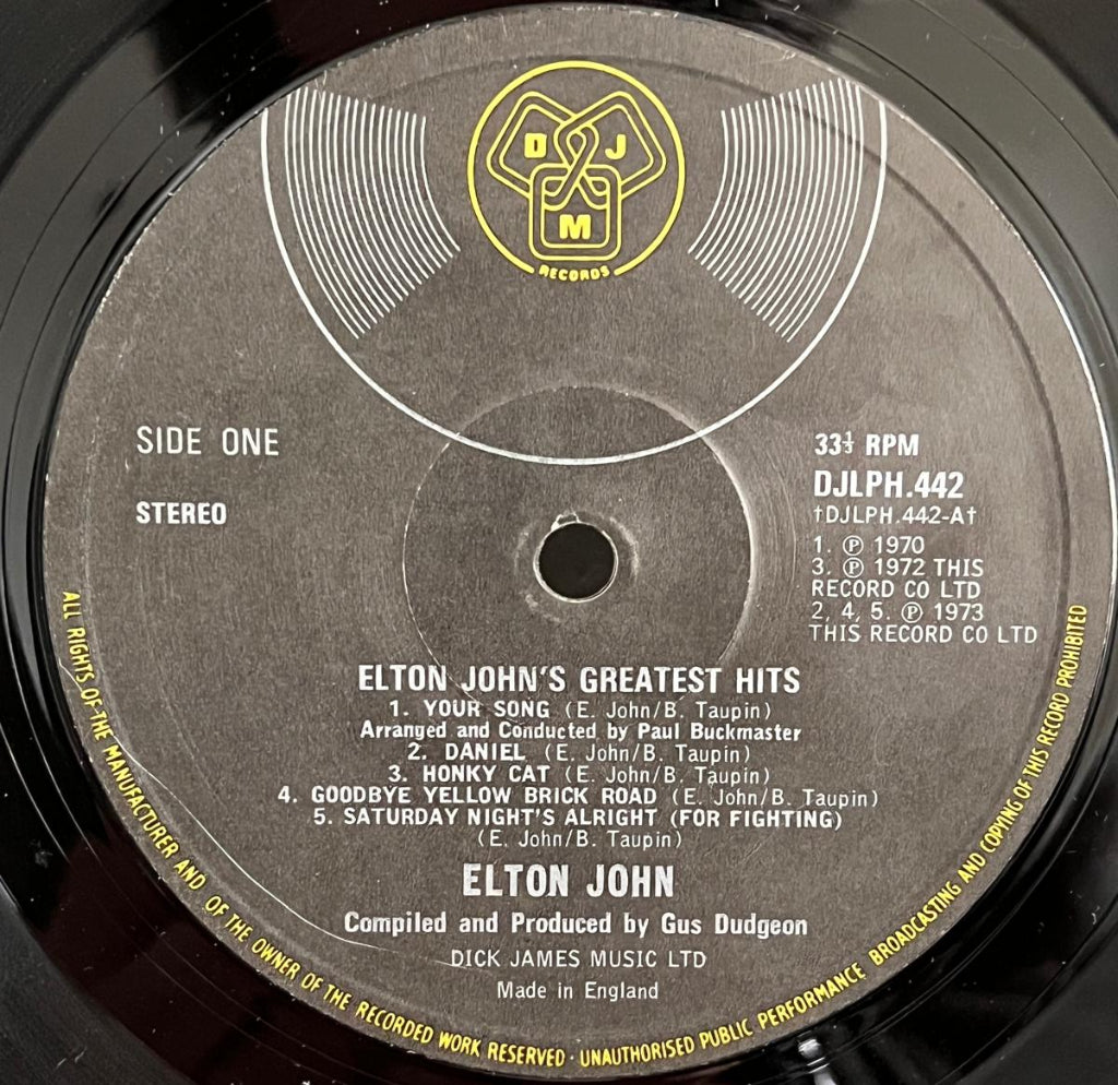 Record label of Elton John's 'Greatest Hits' showing side one details.