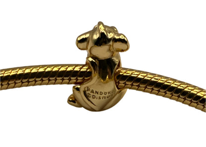 Gold charm with 'Pandora Disney' engraving on a white background