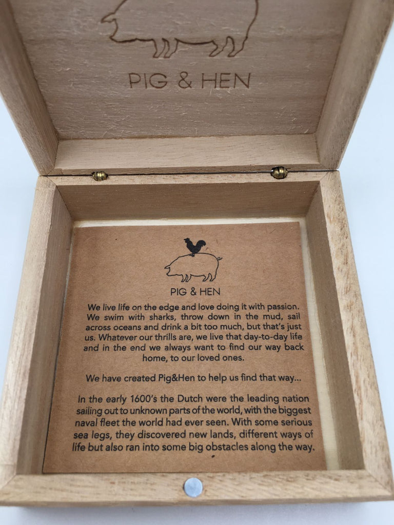 Wooden box with 'Pig & Hen' branding and text on a white background