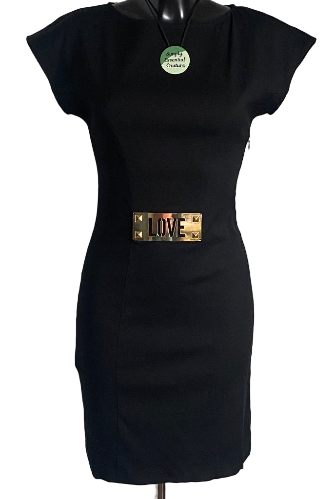 Black dress with a gold 'LOVE' belt on a mannequin against a white background