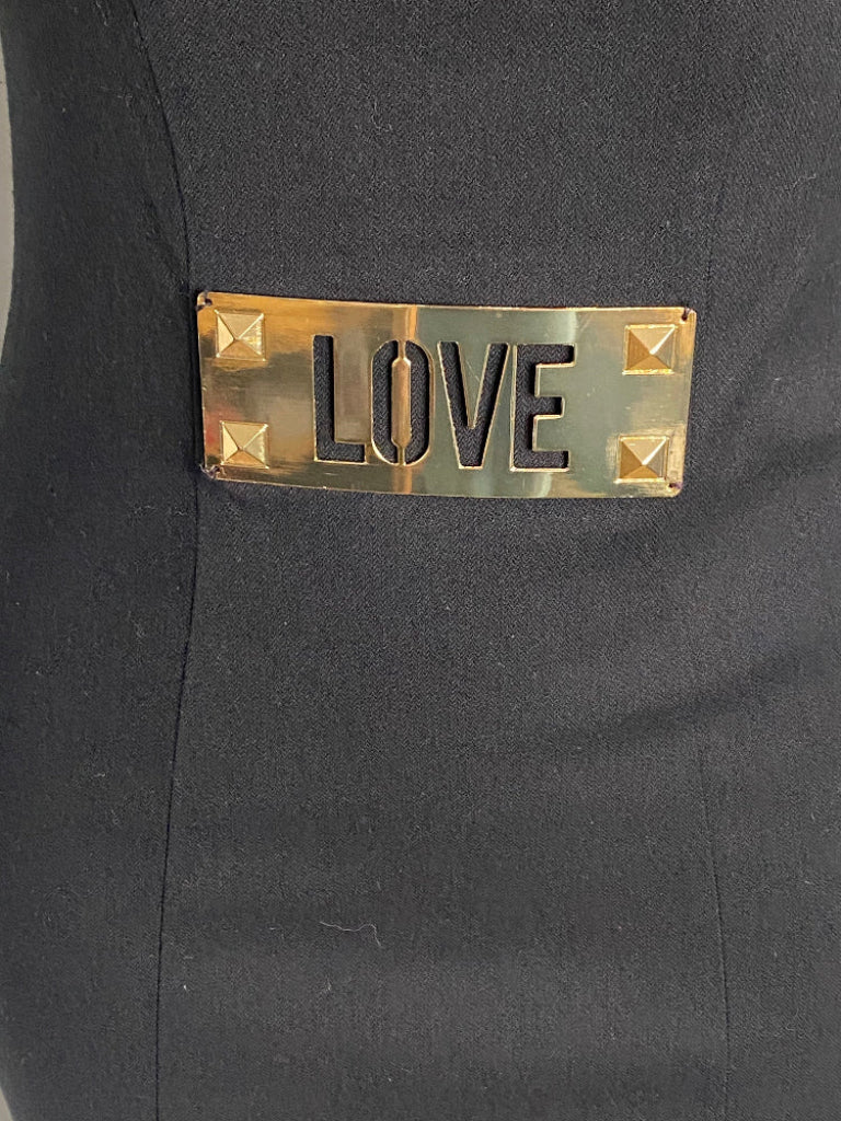 Moschino Brass 'LOVE' plaque on a black dress UK8