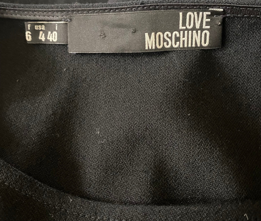 Black fabric with 'Love Moschino' label