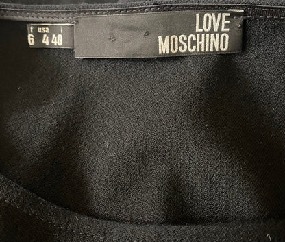 Black fabric with 'Love Moschino' label