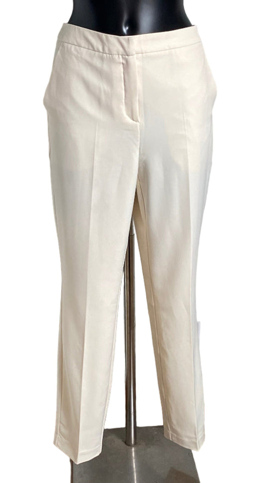 Cream Trousers on a mannequin against a white background