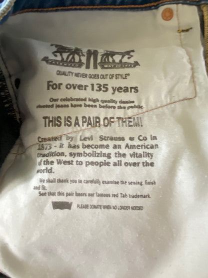 Levi's brand label on a pair of jeans with text about the brand's history.