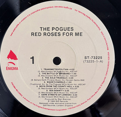 Vinyl record label for 'Red Roses For Me' by The Pogues with Side 1 tracklist and Enigma logo.