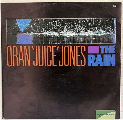 Vinyl record cover for 'The Rain' by Oran Juice Jones on a plain background
