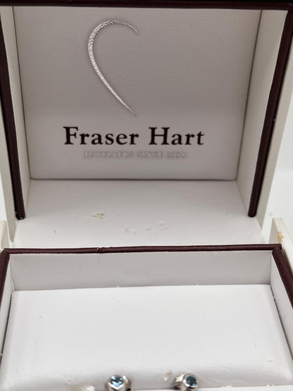 Jewelry box with Fraser Hart branding and a heart-shaped earring.