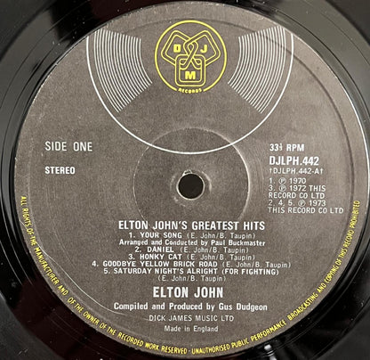Record label of Elton John's 'Greatest Hits' showing side one details.