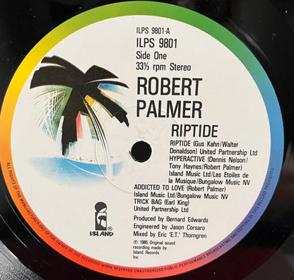 Robert Palmer's Riptide - Side 2 Label is the 1980s UK Island with a 'Palm Tree' image and a rainbow rim.